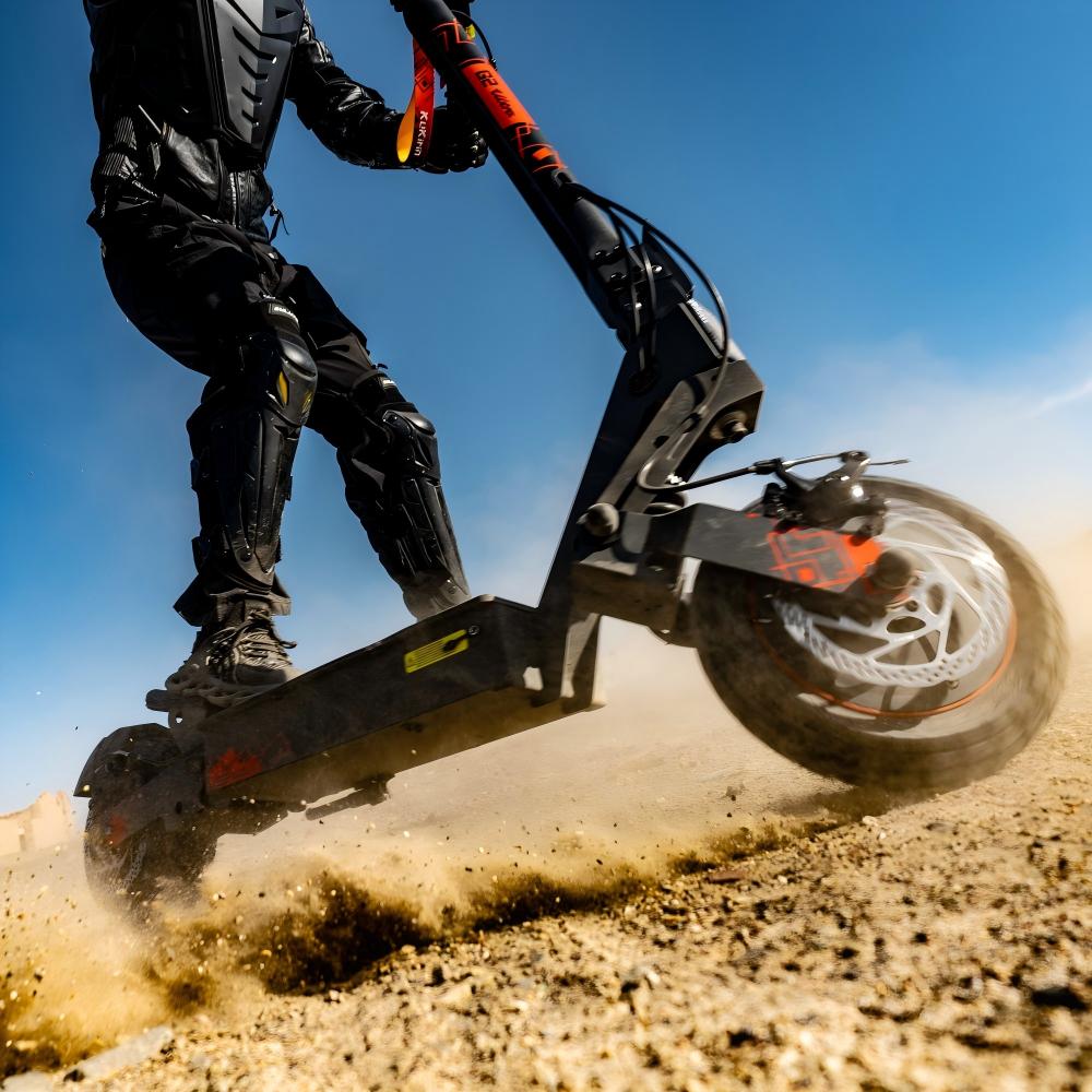 High-torque KuKirin G2 Ultra scooter kicking up dirt on an intense off-road trail ride.